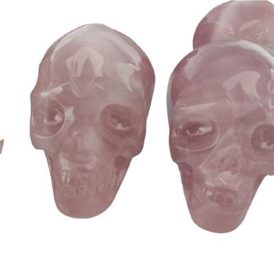 China Europe Hand Carved Craft Natural Crystal Skulls Mounted Quartz Crystal Skulls Carvings for sale