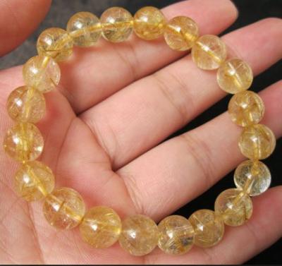 China Beautiful natural crystal bracelet Europe rutilated quartz crystal hand gold chain for sale