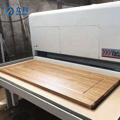 China CHANSON Wood Door Vacuum Membrane Press Machine and Cabinet for PVC, Veneer, Hot Transfer, Leather Wood Door Press for sale