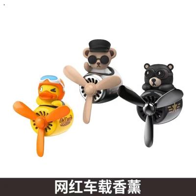 China Cute Yellow Duck Lovely Car Perfume Hakko Bear Car Outlet Ornaments Air Vent Decoration Small Car Decoration for sale