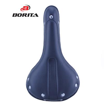 China Rivet Design High Performance Vintage Style Cr-Mo Rail Cow Leather Bicycle Saddle With Rivet for sale