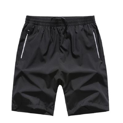 China Anti-Wrinkle Summer Code Fattening Men Jogging Sports Running Shorts With Zipper Pockets Gym Fitness Polyester Mens Shorts for sale