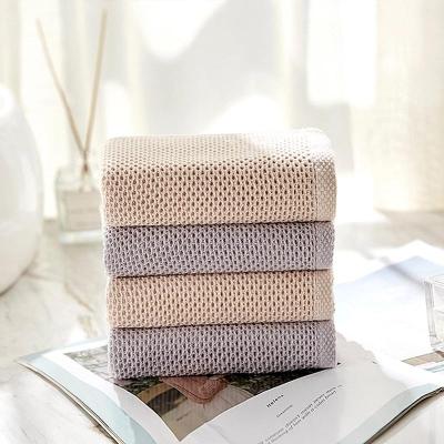 China Low Price Soft Skin Friendly 100% Cotton Waffle Bath Hand Towels Disposable For Home Kitchen Bath Use for sale