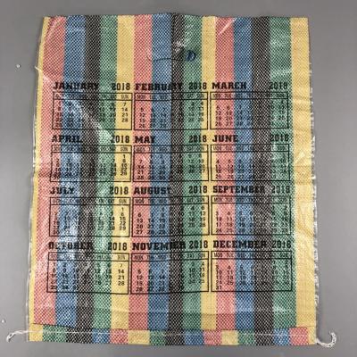 China MINCHENG Calendar Printing Rainbow Color Shopping Bags BIODEGRADABLE PP Woven Bag for sale