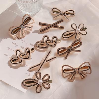 China Hot Selling Ins Hair Clip Female Bangs Word Clip Bow Hairpin Rhinestone Pearl Girl Hair Accessories for sale