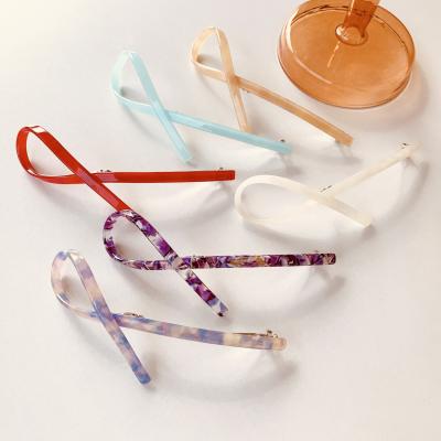 China Single Clip Hair Side Bow Spring Ponytail Clips Acetate Hair Accessories For Women for sale