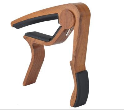 China Amazon guitar best sell same paragraph guitar wooden capo for sale