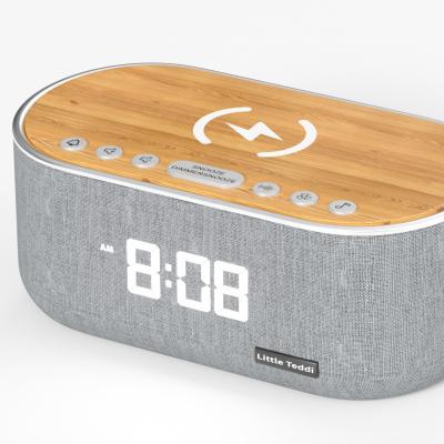 China FM/Dual alarm/Wireless charging alarm clock with wireless charging for sale