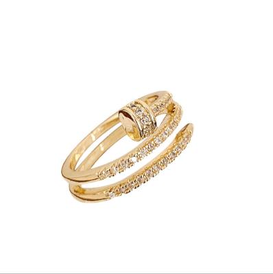 China Simple Design CLASSIC Real Gold Plated Jewelry Womens Spiral Rings Gold Gemstone Couple Rings for sale