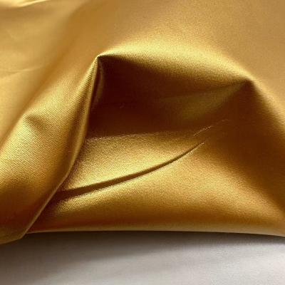 China 100% Polyester 104GSM Outdoor Jacket Fabric Water Resistant With Gilded Gold Fabric for sale