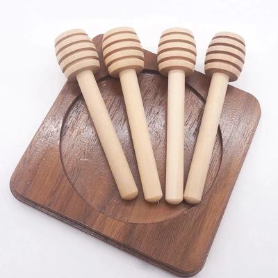 China Sustainable Wooden Honey Stick Long Handle Stick Dipper Supplies For Beekeeper for sale