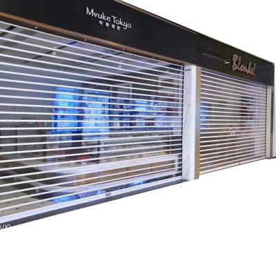 China Folding Crystal Screen Roll Up Shutter Door for sale