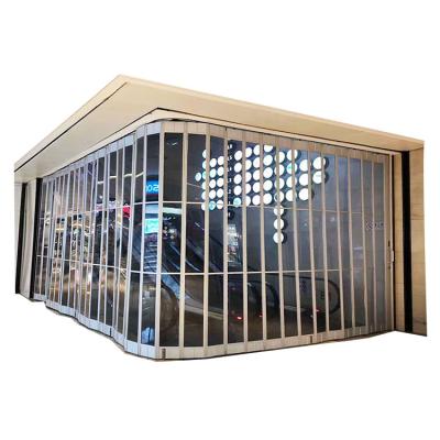 China Shopping Mall Front Transparent Folding Door Electric Waterproof Automatic Sliding Door for sale