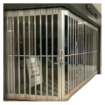 China Waterproof Crystal Clear See Through Plastic Folding Polycarbonate Roller Shutter Door for sale