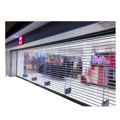 China Automatic Clear Transparent Folding Screen Polycarbonate Roller Shutter For Commercial Store for sale