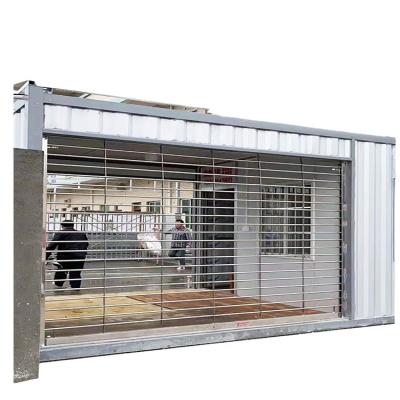 China Aluminum Alloy Panel Windproof Steel Rolling Up Fast Shutter High Speed ​​Hard Panel Door for sale