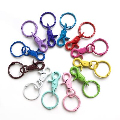 Cina Promotional multi color custom metal plastic key rings with swivel lobster clasp key ring in vendita