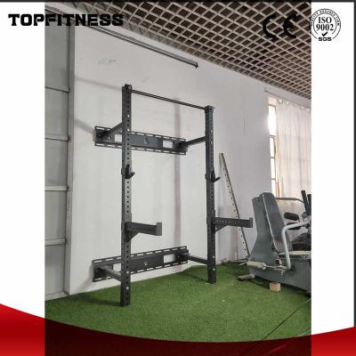 China Folded Unfolded Rack Barbell Rack Hammer Strength Machine Multi Functional Power Rack for sale