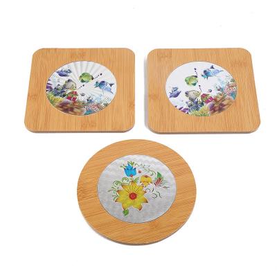 China Sustainable Bamboo Wood Round Square Coaster Set With Stainless Steel Bottom Heat Insulated for sale