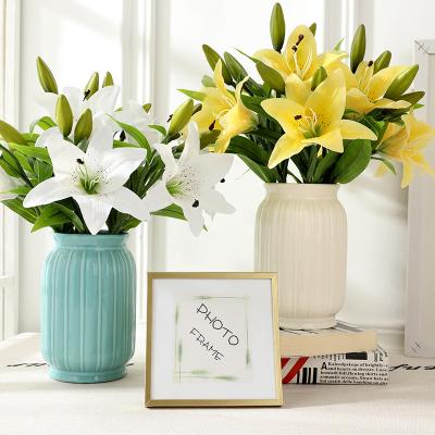 China Craft Flower Caring Artificial Flower Mini Single Real Touch Feel Lily Wholesale Wedding Home Decoration Simulation for sale