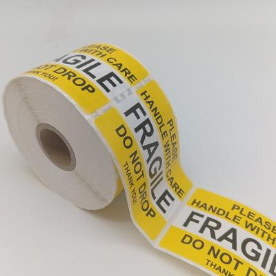 China Export Fragile2x3x500 Waterproof Yellow Cardboard Adhesive Labels Packing Warning Fragile Label for sale