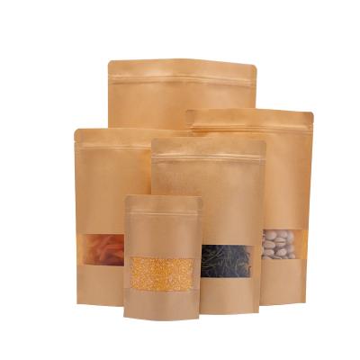 China Recyclable size 9*14+3 frosted food packaging kraft paper bag clothing packaging zipper windowed bag for sale