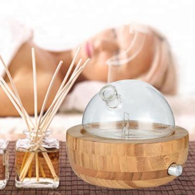 China New Design 25ml LED Car Ele Ultrasonic Cool Mist Wooden Glass Humidifier Creative Essential Oil Diffuser for sale