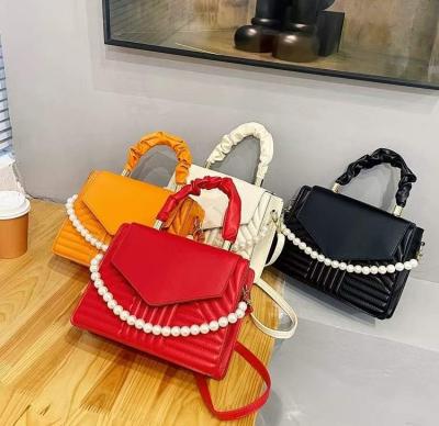 China 2022 Famous Bags Women Leather High Quality Designer Ladies Luxury Handbags Pinch Fashion Shoulder Bags Wholesale Price YX1019 for sale