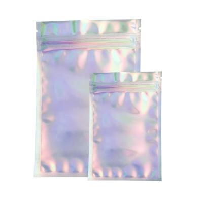 China Custom Color Barrier Smellproof Mylar Laser Aluminum 3 Side Seal Plastic Holographic Rainbow Packaging Bag for sale