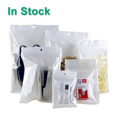 China Recyclable Clear Front White Back Reclosable Zipper Plastic Packaging Bags With Hanging Hole for sale