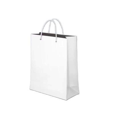 China Recyclable Recycled Custom Tanning Clothes Shopping Paper Bag for sale