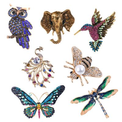 China PUSHI Crystal rhinestone bow pins brooches owl dragonfly enamel peacock brooch pin simple animal women accessories brooches for sale