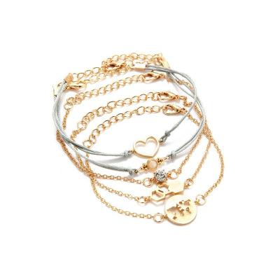 China Other PUSHI Heart Bangle Gold Woven Bracelet Set Women 5 Pieces Bracelet Set Jewelry for sale