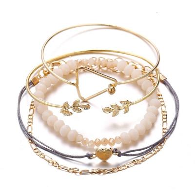 China PUSHI Contracted Geometric Heart Leaves Rice Bead Bracelet 5 Piece Bracelet Rose Gold Bangle Bracelet Set for sale