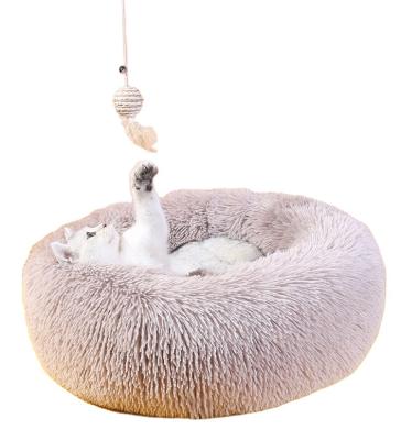 China Modern Indoor Round Pillow Bolster Waterproof Pet House Sleeping Fluffy Beds for sale