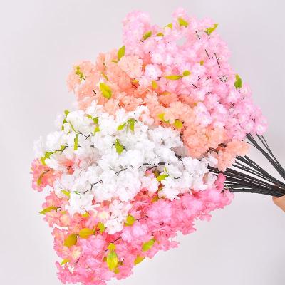 China Plastic Art Decor Imitation Cherry Blossom Branch Cherry Blossom Tree Flower Wedding Living Room Mall Decoration for sale