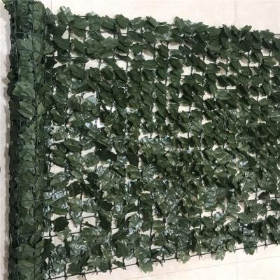 China Eco-friendly Outdoor Garden Green Artificial Leaf Fence And Artificial Grass Fence Plastic Leaf Fence for sale