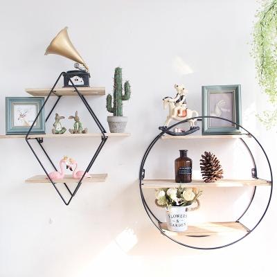 China New Fashion Morden Wall Rack Unique Design Iron Hanging Shelf For Home Decoration for sale