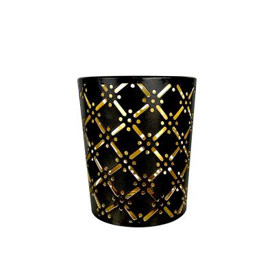 China Morden Wedding Black Metal Cylinder Shape Circle Cavity Art Tea Light Candle Holder for Home Decor for sale