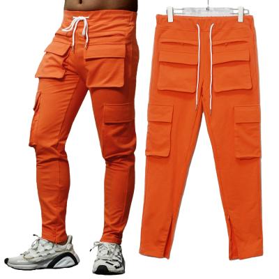 China Custom Men's Cargo Sweatpants Orange Logo Casual Jogger Pants Stacked Plus Size With Pockets for sale