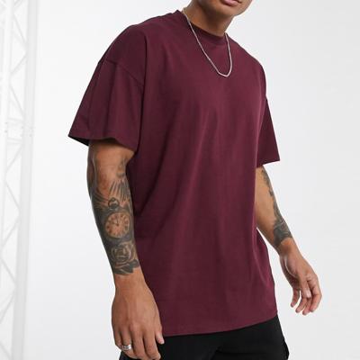 China Custom Anti-Wrinkle Summer 230g 100% Cotton Plain T-shirts Dropped Shoulder Oversized Mens T-shirts for sale