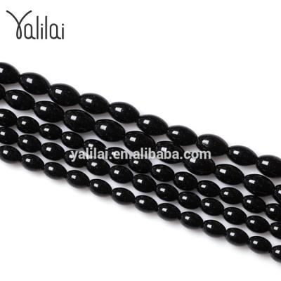 China 2019 Cats Stone Natural Light Black Onyx Agate Stones Round Black Onyx Beads for sale