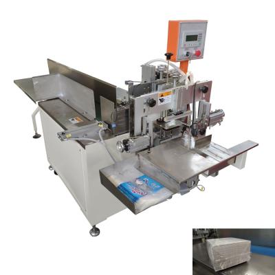 China Easy operate plastic bag table napkin tissue paper packing and sealing machine for sale