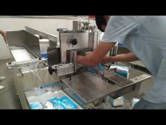 Semi automatic napkin paper packing machine