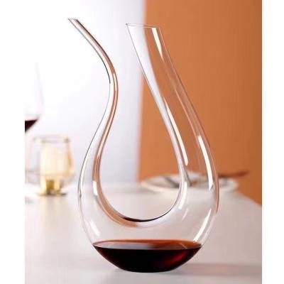 China Manual Grinding And Polishing Custom Design Luxury Small Wine Glass Decanter Set U Shaped Decanter For Wine Drinkers for sale