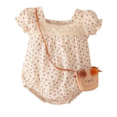 China Breathe Free 2022 Summer Jumpsuit Clothes Newborn Flower Bubble Sleeve Hollowed Out Apricot Baby Romper for sale