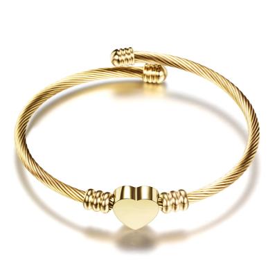 China Latest New Design Stainless Steel Jewelry Gold Plated Stainless Steel Bangle Heart Bracelet With Logo for sale