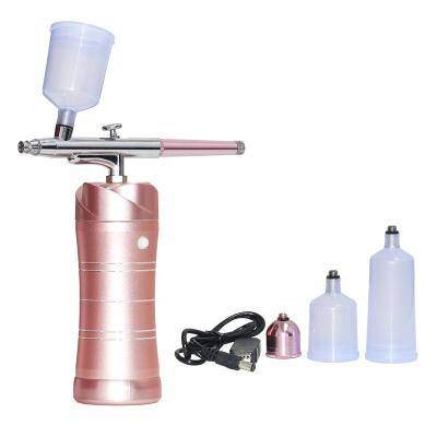 China Skin Tightening Airbrush Machine Apparatus Beauty Instrument Home Electric Facial Massage for sale