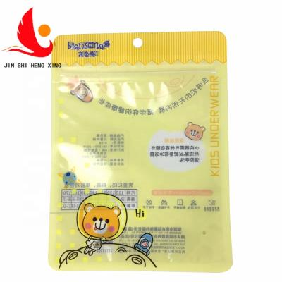 China Recyclable Resealable Yellow Clothing Bag Custom Packaging Plastic Bags With Laminated Zipper for sale