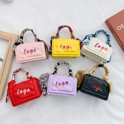 China New Designer Daily Used PU Leather Candy Color Kids Mini Messenger Famous Trendy Luxury Bags Brand Shoulder 2022 Bags for sale